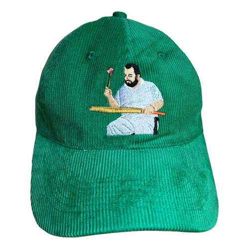 Knocking the bat in - green corduroy hat - Dadi Cools